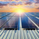 Améliorer le DPE de sa copropriété en installant des panneaux solaires sur le toit de son immeuble.